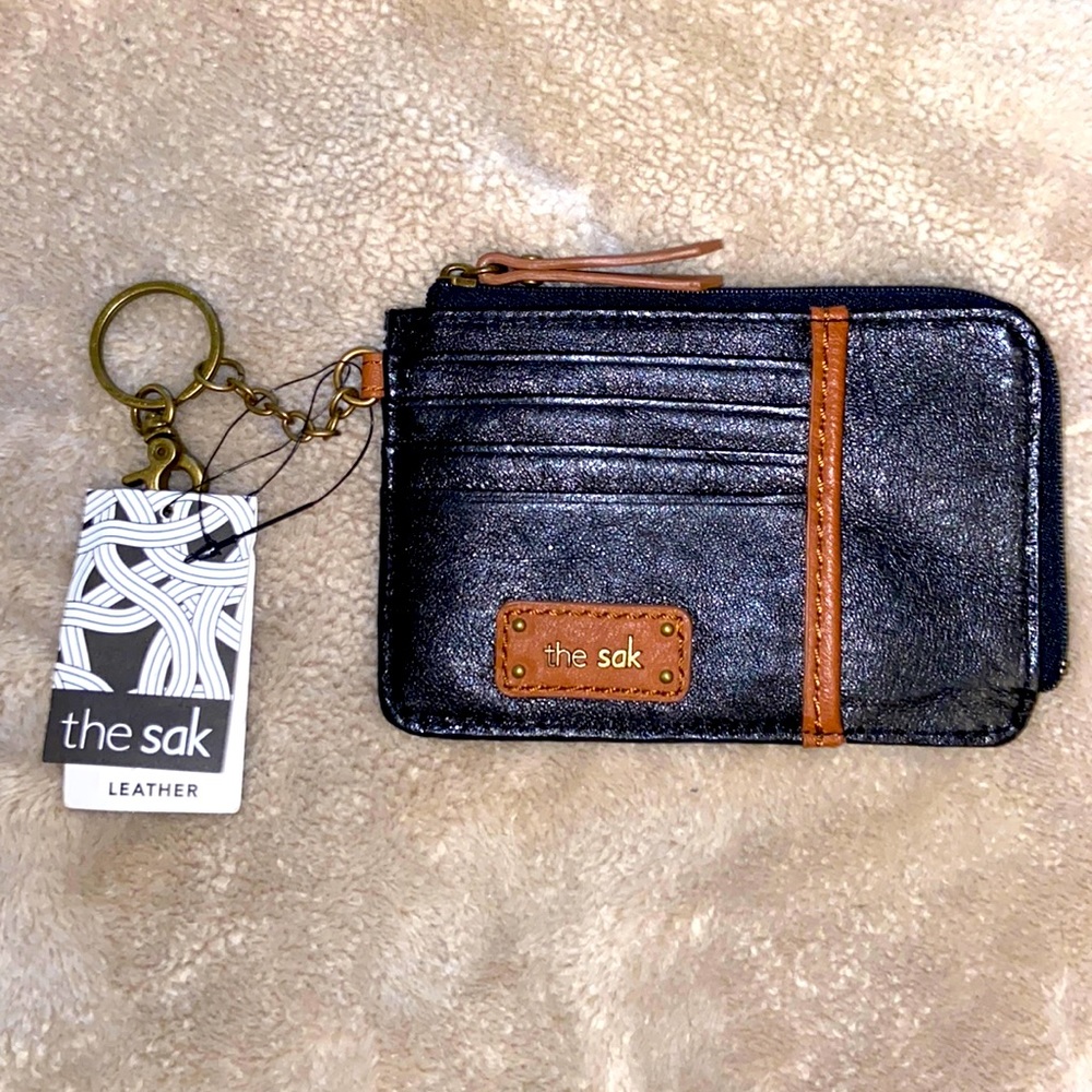 “The Sak”  small card wallet , the color is Black and Brown.
